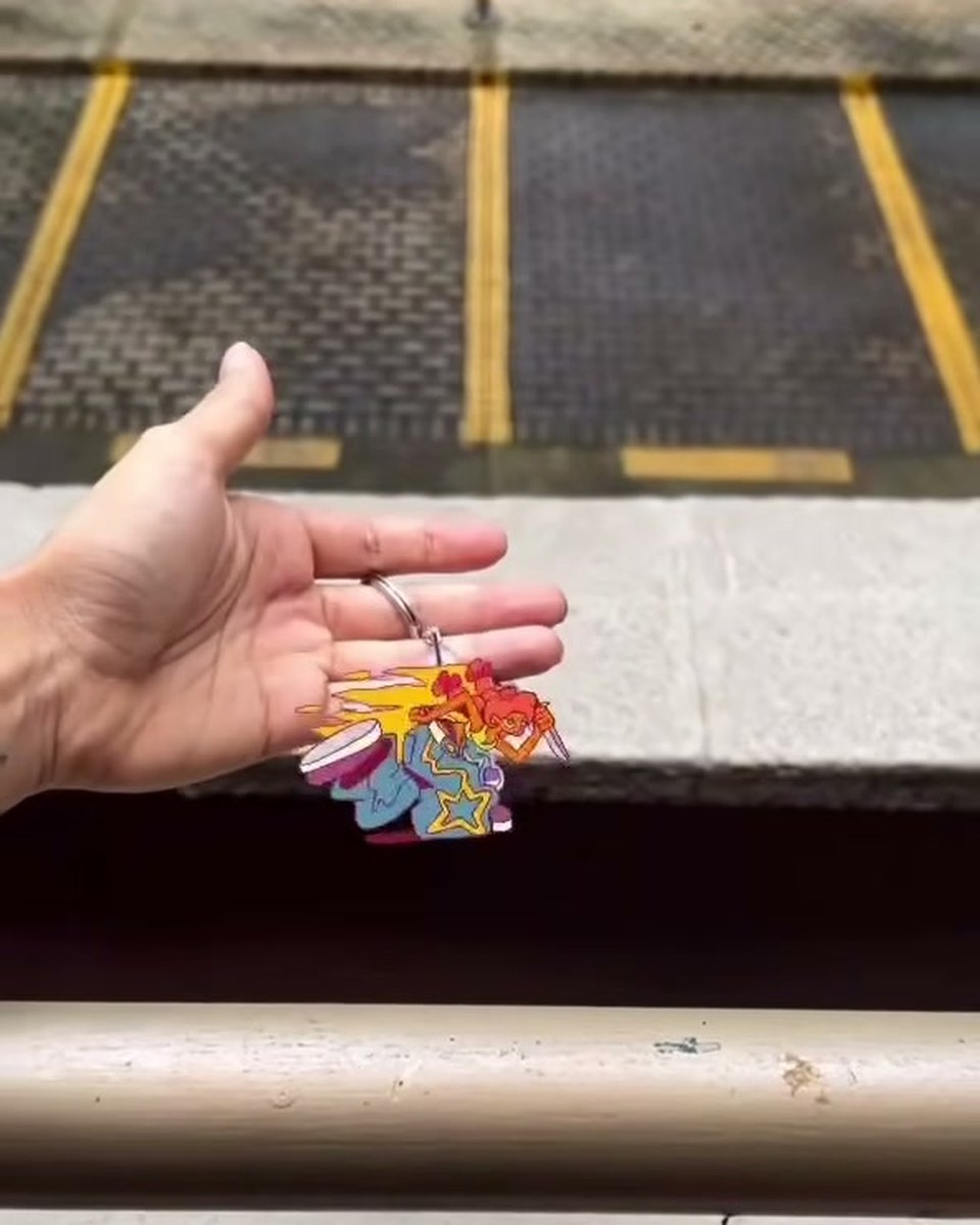 A keychain with a character inside