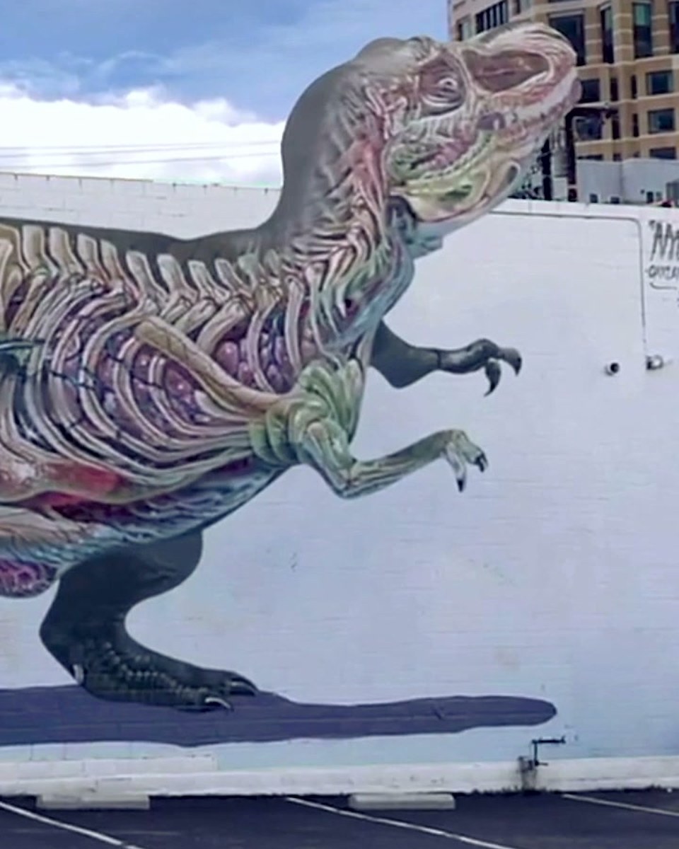 A T-Rex that comes out of the wall
