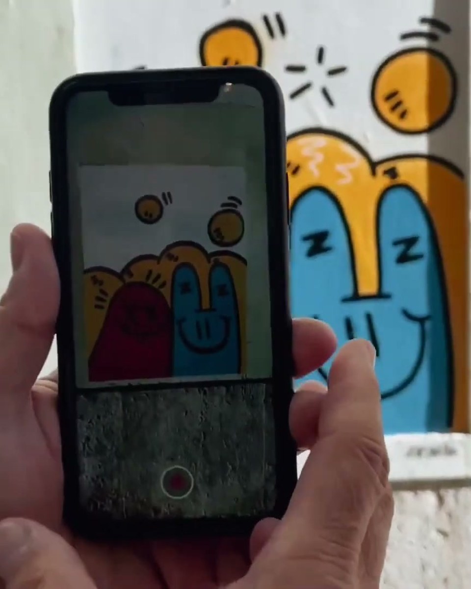 A guided street art tour with an AR layer